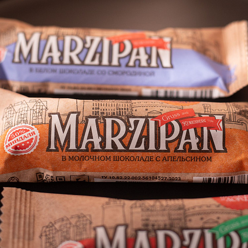 Марципановый батончик в молочном шоколаде с апельсином